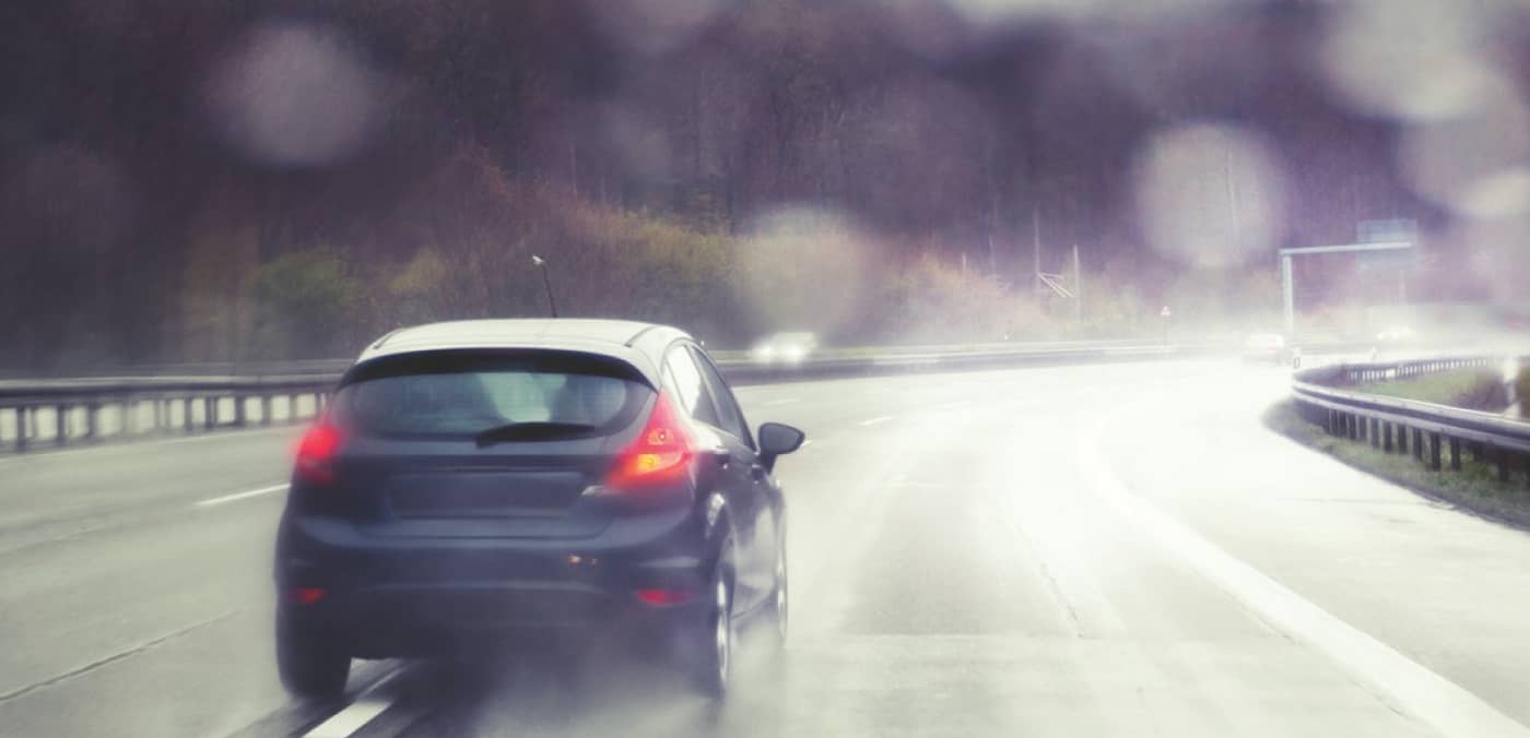 Driving on a Wet Road Image